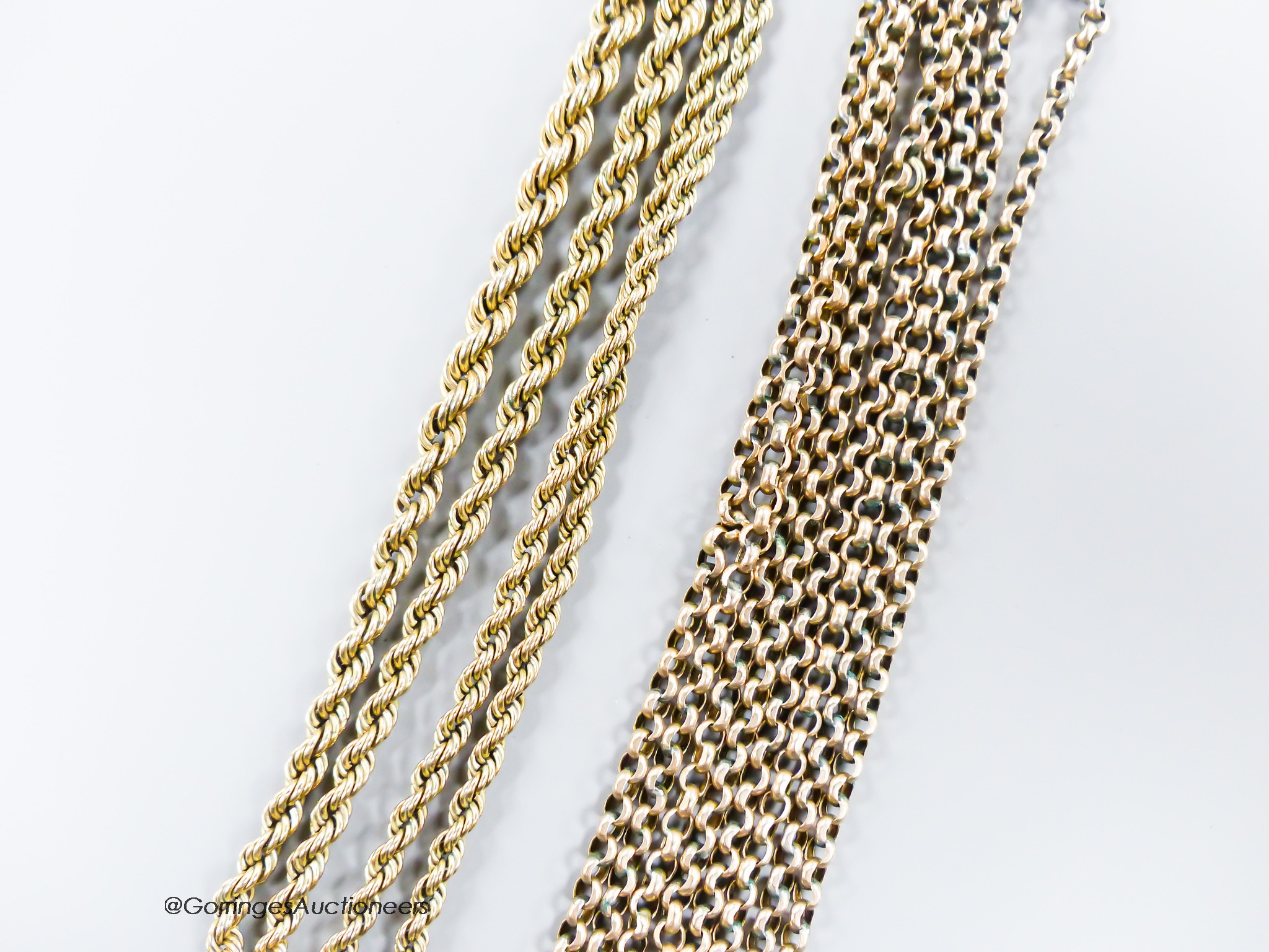 A yellow metal and rope twist chain, 46cm (a.f.) and an Edwardian yellow metal guard chain (a.f.), 106cm, gross 19.6 grams.